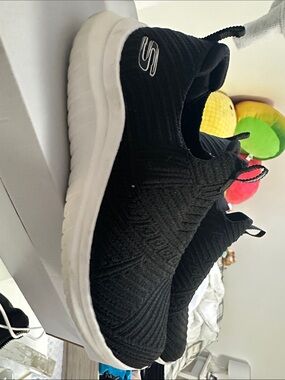 Skechers Black Knit Slip-On Sneakers with White Sole